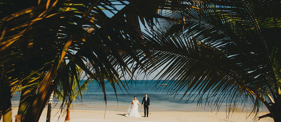 Wedding photographers in Austin - a bride and groom on a beach - Roatan destination wedding photographers