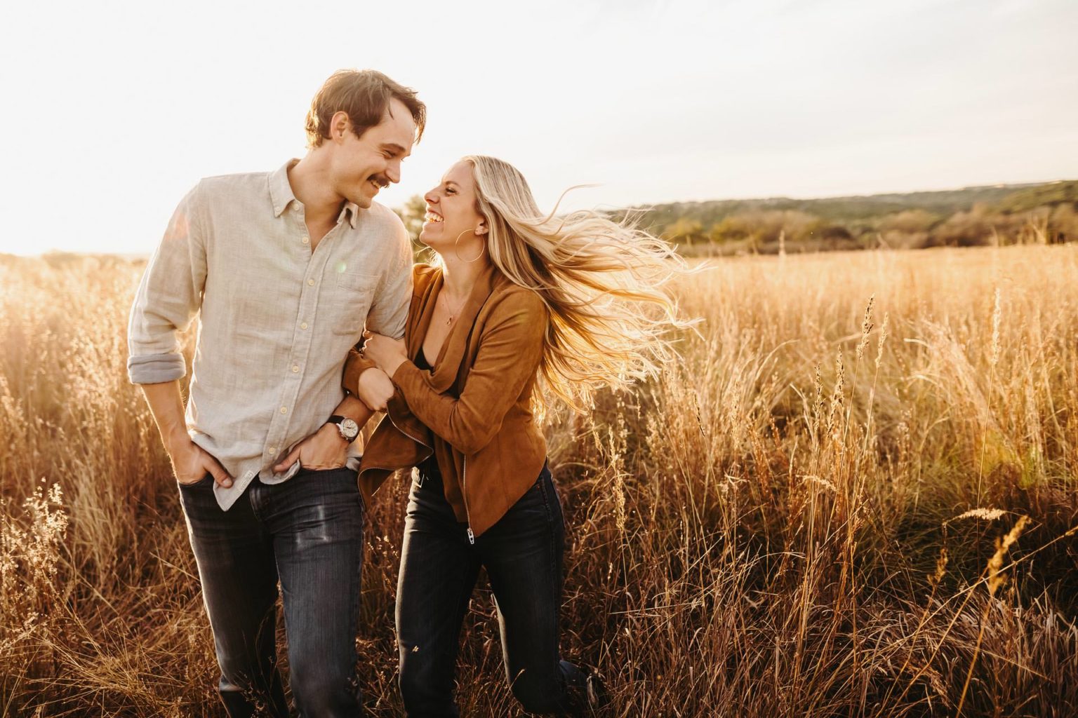 Austin Engagement photos colorful golden hour commons ford red grass fun exciting